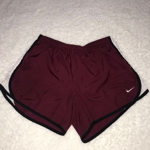 Red Nike shorts